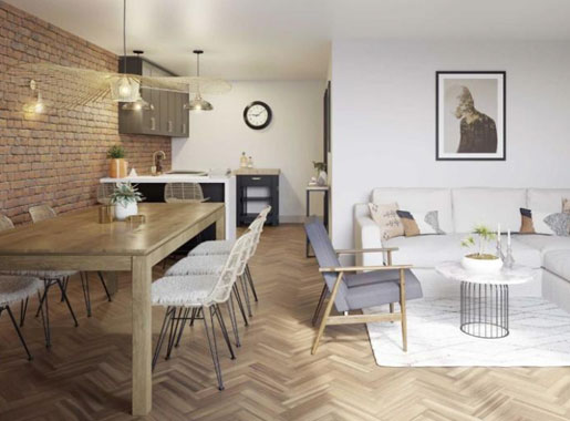view of student accomodation room showing bed and kitchen area